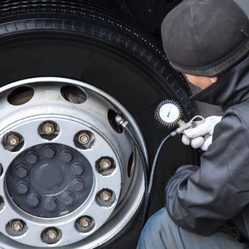 portable air compressor for inflating tires