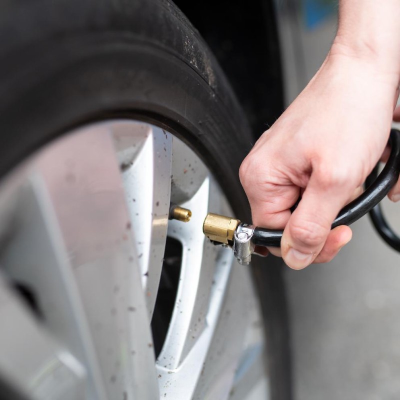 portable air compressor for inflating tires